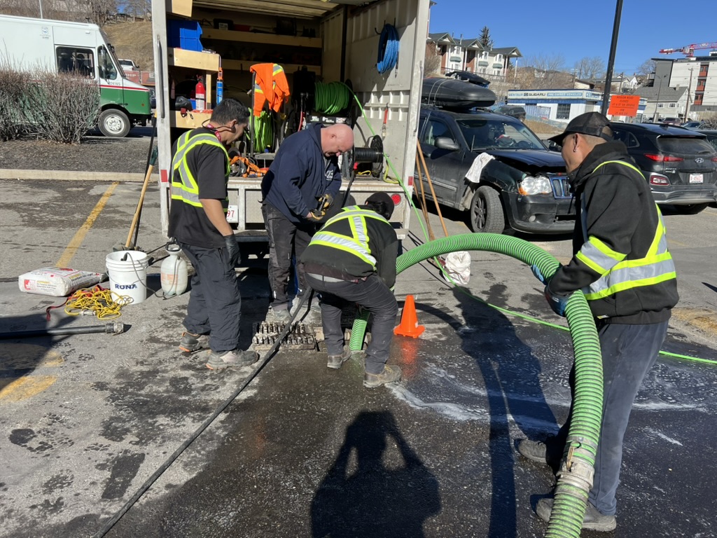 GDM Vac crew working on sewer jetting and grease line cleaning in Calgary